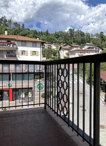 a balcony with a view of a city at Cauriol Suites 2.3 in Cavalese