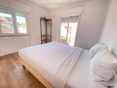 Postel nebo postele na pokoji v ubytování Delta Apartment