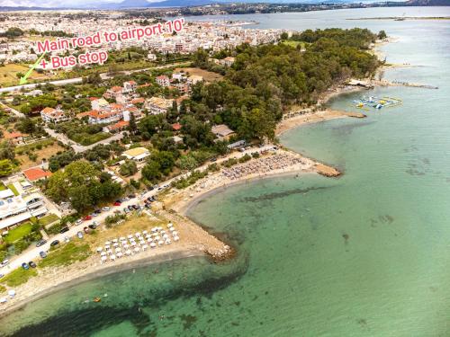 an aerial view of a beach with a resort at Palmeira Studio in Preveza