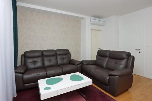 Posezení v ubytování Apartments Novalja West