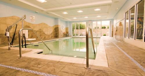 a large swimming pool in a house at Holiday Inn Morgantown-University Area, an IHG Hotel in Morgantown