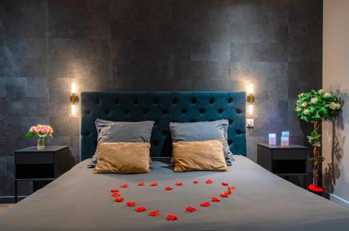 Ένα ή περισσότερα κρεβάτια σε δωμάτιο στο Lorient Love Room Le King Size