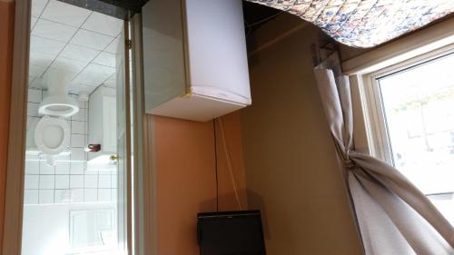 TV a/nebo společenská místnost v ubytování A Voyageur's Guest House