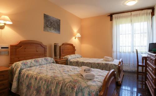 Katil atau katil-katil dalam bilik di Hostal Casa Ramón