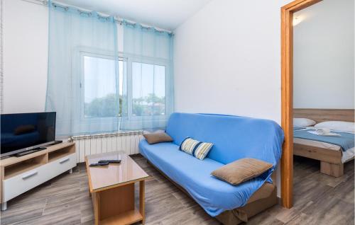 TV a/nebo společenská místnost v ubytování Nice Apartment In Rab With Wifi