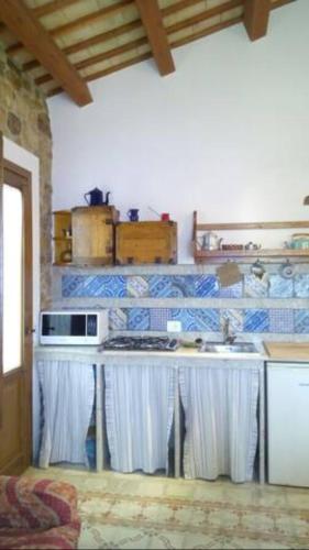 Una cocina o zona de cocina en Rustico Zagara