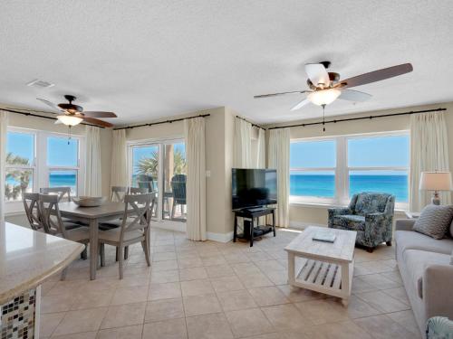a living room with a view of the ocean at Emerald Dunes 301 by Newman-Dailey in Destin