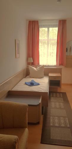 a room with two beds and a window at Villa Hoffnung in Bad Elster