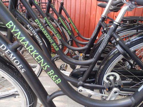 a row of bikes parked next to each other at Bymarkens B&B in Roskilde