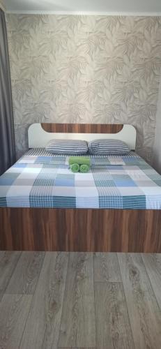 Ένα ή περισσότερα κρεβάτια σε δωμάτιο στο Ауэзова 49б, 2х комнатная