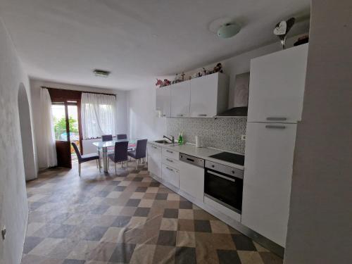 Kuchyň nebo kuchyňský kout v ubytování Eros Rooms
