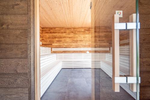 a sauna with wooden walls and a wooden ceiling at stuub todtnauberg in Todtnauberg
