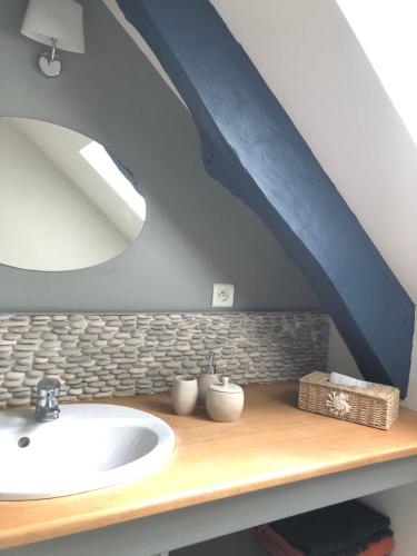 a bathroom with a sink and a blue ceiling at Chambre privée Luz in Luz-Saint-Sauveur