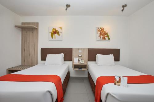Кровать или кровати в номере Casa Andina Standard Machu Picchu