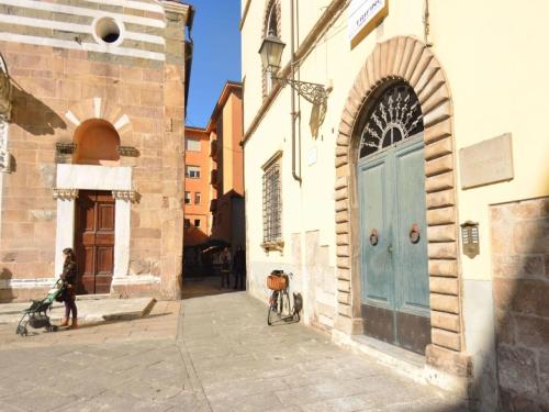 In an ancient building, very bright, with a wonderful view of Lucca