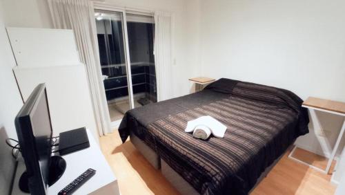 Krevet ili kreveti u jedinici u objektu Hermoso departamento en Villa Crespo con pileta- Frias