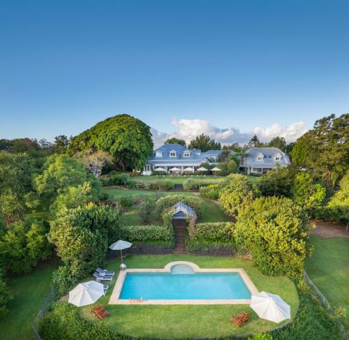 an aerial view of a house with a swimming pool at Spicers Clovelly Estate in Montville