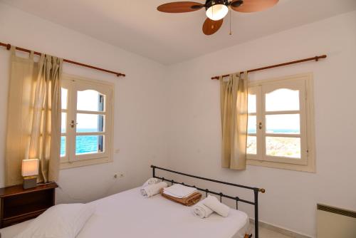 Posteľ alebo postele v izbe v ubytovaní Naxos town sea view apartment free parking