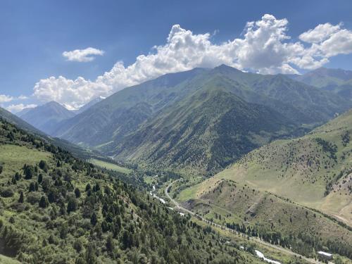 an aerial view of a mountain valley with trees at Guest House NAUKA#54 in Bishkek