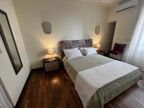 Posteľ alebo postele v izbe v ubytovaní Al Castello