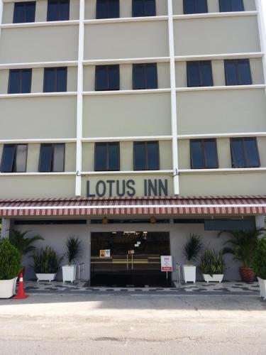 Фасад или вход в Lotus Inn