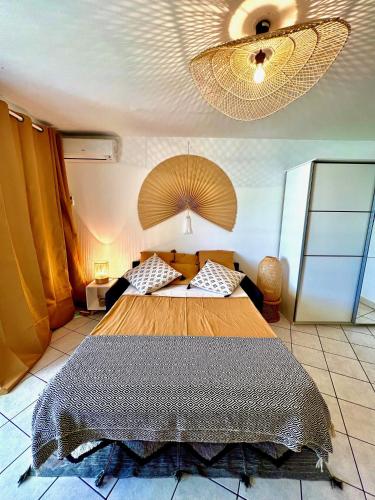 Photo de la galerie de l'établissement Appartement 'Kribi' proche plage de Boucan Canot, à Saint-Gilles les Bains