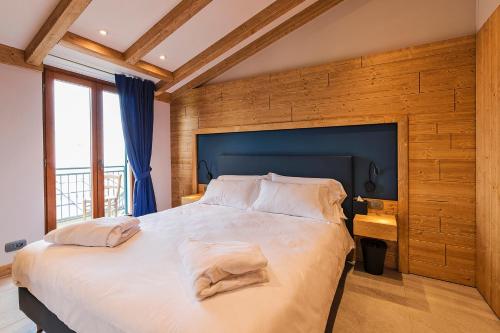 Кровать или кровати в номере La Stua