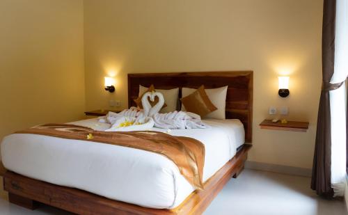 Letto o letti in una camera di Penida Bay Village