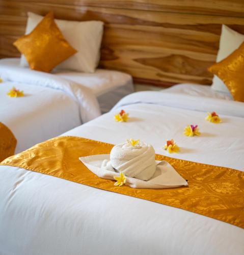 Letto o letti in una camera di Penida Bay Village