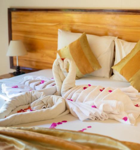Letto o letti in una camera di Penida Bay Village