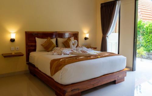 Letto o letti in una camera di Penida Bay Village