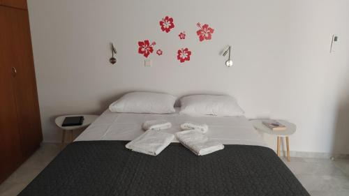 Posteľ alebo postele v izbe v ubytovaní SunSea Apartment