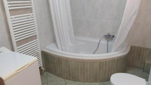 Kúpeľňa v ubytovaní SunSea Apartment