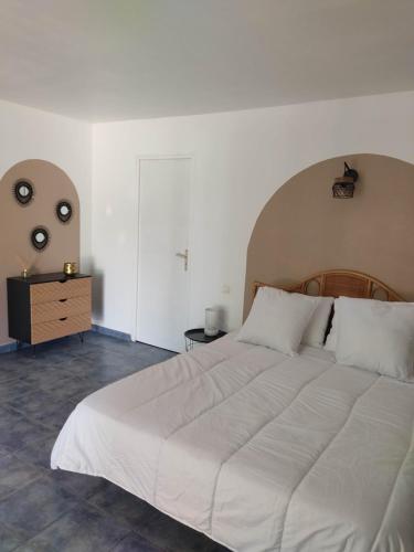 מיטה או מיטות בחדר ב-Les bergeries de Montestremo