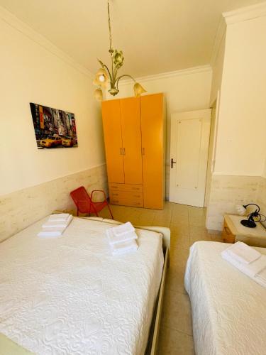 Ένα ή περισσότερα κρεβάτια σε δωμάτιο στο Casa Rilù