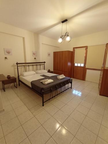a bedroom with a bed in a room at Sofirene I in Batsi