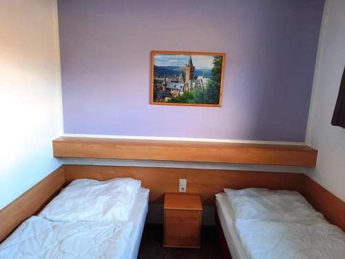 Postel nebo postele na pokoji v ubytování Ferienwohnung Wanderkönige