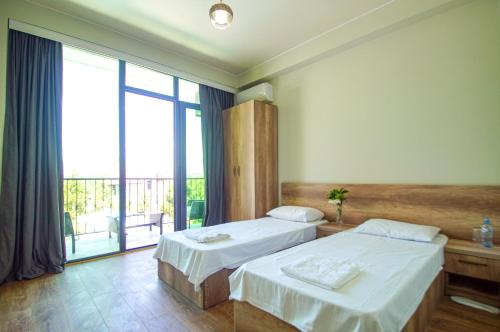 Postel nebo postele na pokoji v ubytování Delta Hotel