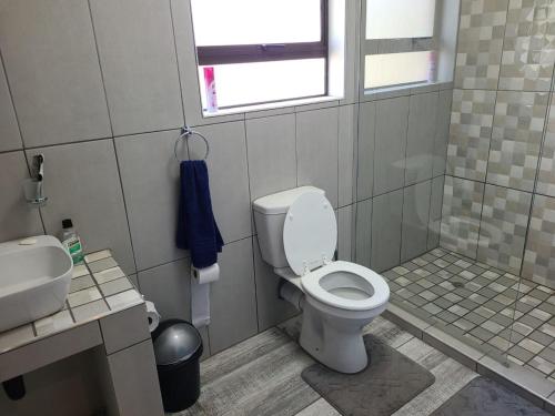 Koupelna v ubytování Cats Corner