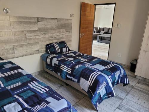 Postel nebo postele na pokoji v ubytování Cats Corner