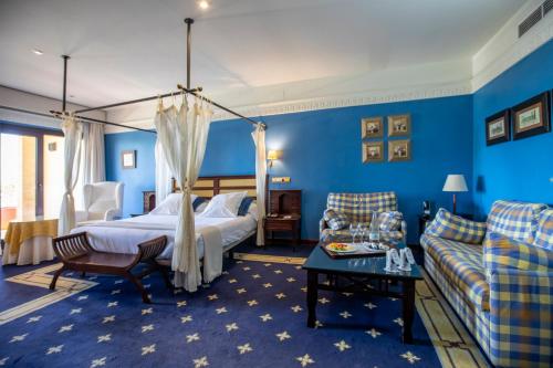 Un pat sau paturi într-o cameră la Hotel Soho Boutique Vistahermosa