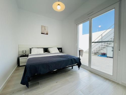 A bed or beds in a room at Villa Tranquilidad
