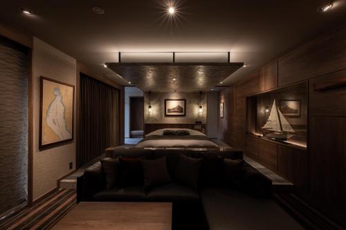 Ein Bett oder Betten in einem Zimmer der Unterkunft Y-HOTEL