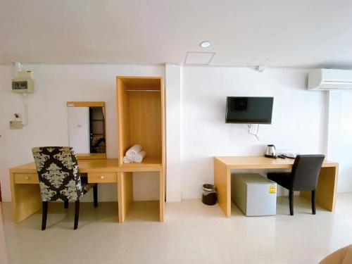 TV a/nebo společenská místnost v ubytování Sila Resort Sukhothai
