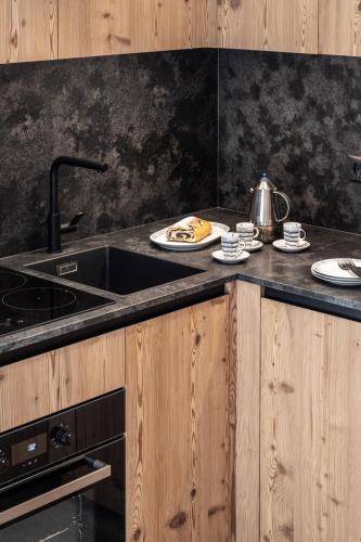 Dapur atau dapur kecil di Oberfallerhof Apartment Ummi