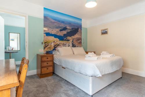 Cama o camas de una habitación en Padarn Hotel