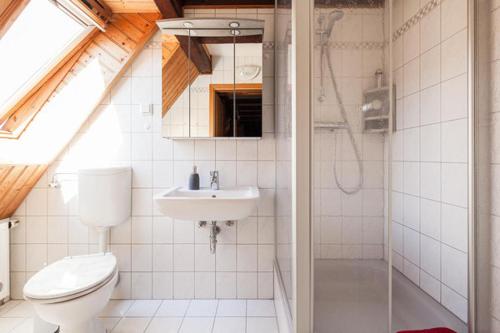 Koupelna v ubytování Apartments "Vier Napoleonslinden"