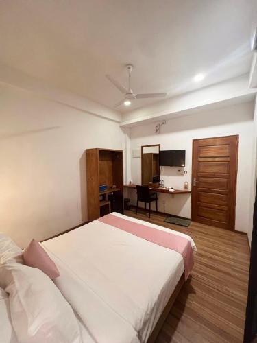 Cama o camas de una habitación en Pearlshine Retreat Maldives