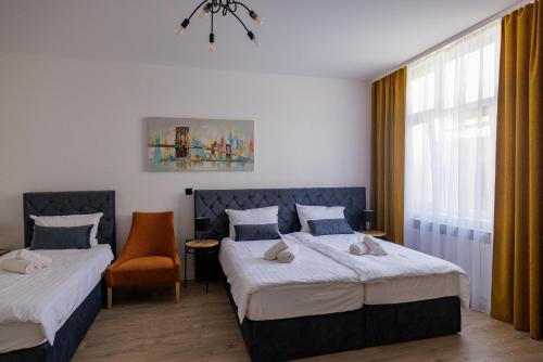 Voodi või voodid majutusasutuse Rooms Lišnić toas