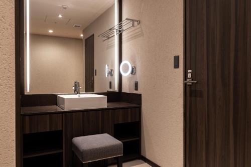Ein Badezimmer in der Unterkunft Y-HOTEL
